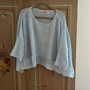 Lightweight Sweater by Poi’s. Loose knit boatneck sweater with pockets.